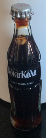 m06011-1 € 8,00 coca cola mini flesje vreemde taal koka koka.jpeg